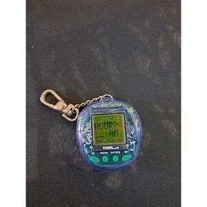 Vintage Giga Pets MICROCHIMP 1997 Tiger Virtual Pets‎ - Works